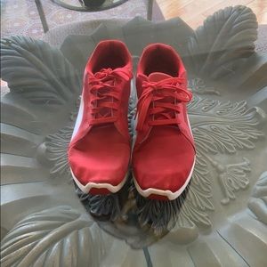Lightly used puma red running shoes